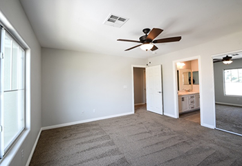 Modernized living room with new drywall and fresh paint in Altadena home.